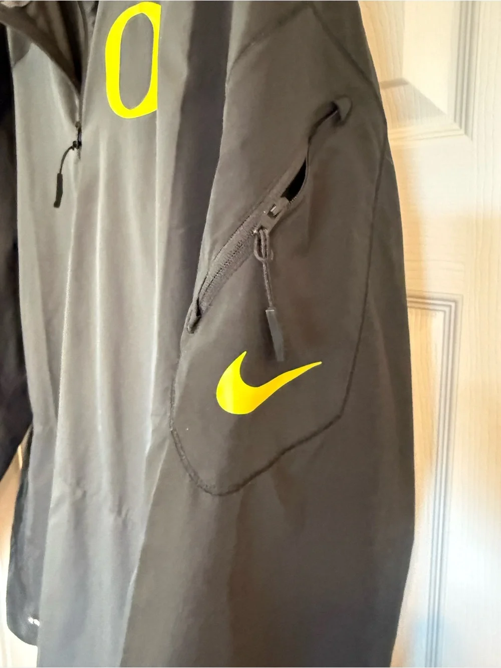 Nike Storm-Fit Men's Black & Gray Windbreaker with Yellow 'O' Logo